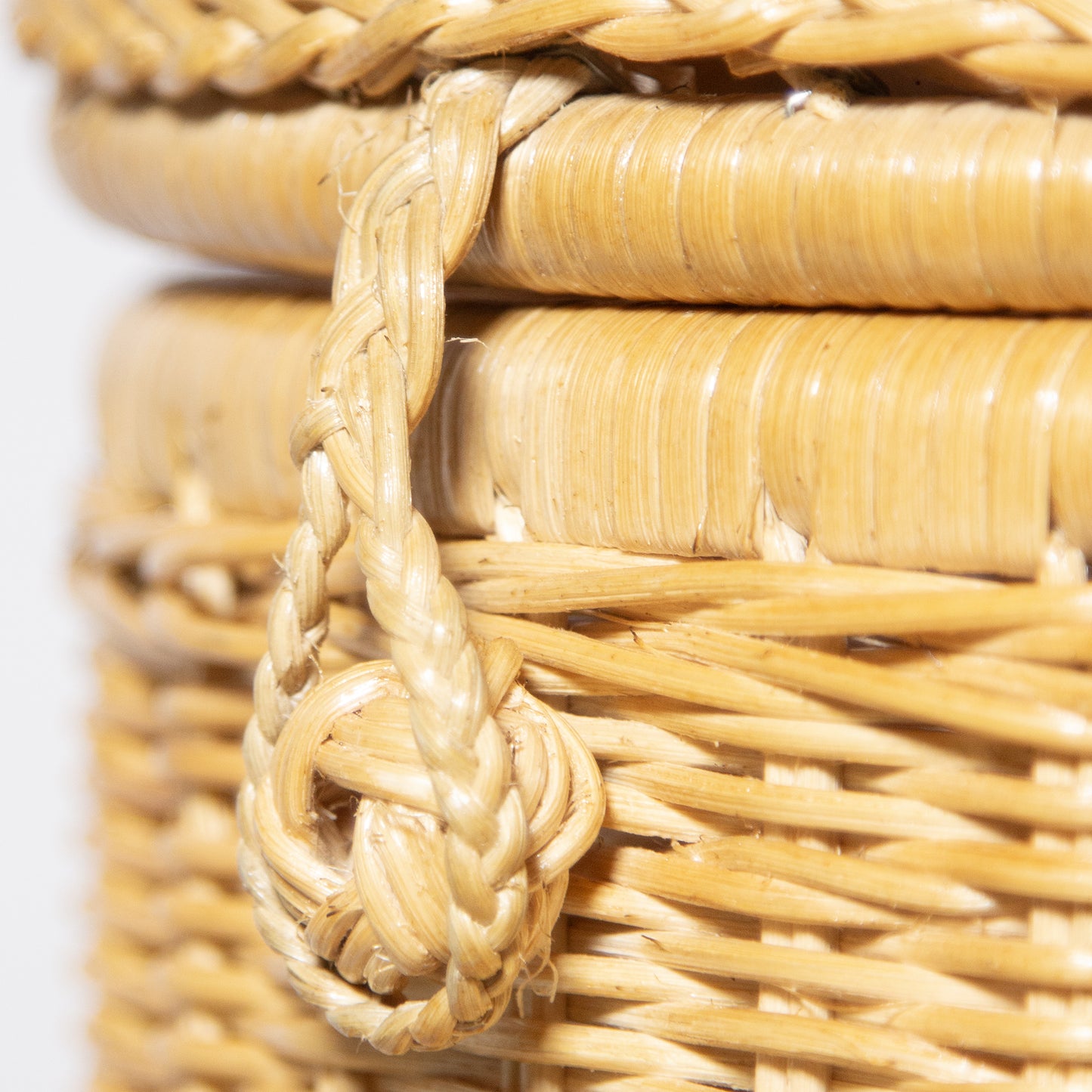 Close up detail of handwoven bicycle basket clasp